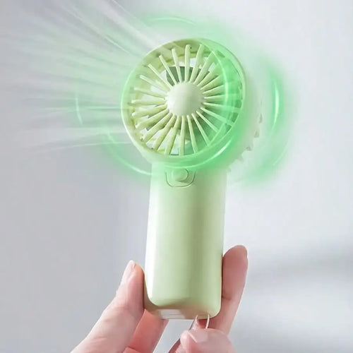 Compact Handheld Fan - Portable, Battery-Powered Personal Cooling Device